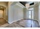 Stunning foyer with decorative tile, a crystal chandelier, and an elegant front door at 3914 Jacob Lake Cir, Las Vegas, NV 89118