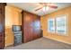 Bedroom with a ceiling fan, carpet floors, a window with blinds, and a murphy bed at 4095 Ridgewood Ave, Las Vegas, NV 89120