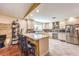 Well-equipped kitchen featuring a large island, stainless steel appliances, and bar stool seating at 4095 Ridgewood Ave, Las Vegas, NV 89120