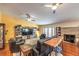 Spacious living room featuring hardwood floors, a fireplace and lots of natural light at 4095 Ridgewood Ave, Las Vegas, NV 89120