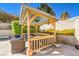 Cozy outdoor gazebo with comfortable seating, perfect for relaxation and entertaining at 4095 Ridgewood Ave, Las Vegas, NV 89120