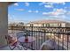 Balcony with outdoor furniture, with a view of neighborhood homes and blue sky at 4305 Morgan Manor St # 3, North Las Vegas, NV 89032