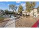 Landscaped community park with walking path, lush plants, and trees at 4305 Morgan Manor St # 3, North Las Vegas, NV 89032