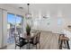 Dining area with access to a balcony and open to the living area at 4305 Morgan Manor St # 3, North Las Vegas, NV 89032