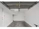 Clean, empty garage with high ceilings, concrete floor, and ample space at 4305 Morgan Manor St # 3, North Las Vegas, NV 89032