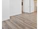 Hallway with wood floors offers seamless transition to different rooms at 4305 Morgan Manor St # 3, North Las Vegas, NV 89032