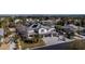 A beautiful two-story home featuring solar panels, a three-car garage, and lush landscaping at 4880 Hayride St, Las Vegas, NV 89149