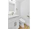 Bright bathroom with a marble vanity and a modern toilet, designed for comfort and efficiency at 4880 Hayride St, Las Vegas, NV 89149