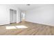 Spacious bedroom offering wood-look flooring and a walk-in closet at 4880 Hayride St, Las Vegas, NV 89149