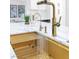 Close-up of a modern kitchen with a gold kitchen sink, faucet, and countertop at 4880 Hayride St, Las Vegas, NV 89149