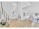 Bright, open-concept living room with built-in shelving and modern decor at 4880 Hayride St, Las Vegas, NV 89149