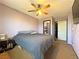 Inviting bedroom with a ceiling fan and neutral tones, creating a relaxing atmosphere at 5288 Emelita St, Las Vegas, NV 89122