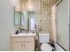 Standard bathroom features a sliding shower door, toilet, and vanity at 53 Montello Ave, Las Vegas, NV 89110