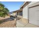 Attractive single-story home showing the front porch, desert landscaping, and attached garage at 53 Montello Ave, Las Vegas, NV 89110
