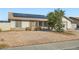 Inviting single-story home with low-maintenance desert landscaping and efficient solar panels at 53 Montello Ave, Las Vegas, NV 89110
