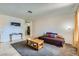 Inviting living room featuring a comfortable carpet and tile flooring with an open layout at 53 Montello Ave, Las Vegas, NV 89110
