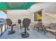 Outdoor covered patio features seating and shade at 53 Montello Ave, Las Vegas, NV 89110