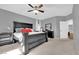 This main bedroom features neutral paint and large windows for natural light at 5949 Pavilion Lakes Ave, Las Vegas, NV 89122