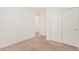 Spacious bedroom with carpet and a pair of closets, offering ample storage at 617 Abrazar Ave, North Las Vegas, NV 89081