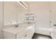 Large bathroom with double sinks, a large mirror, and lots of counter space at 690 Last Dance Pl, Henderson, NV 89011