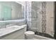 Modern bathroom with a stand-up shower, featuring elegant fixtures and tile accents for a spa-like experience at 6925 Emerald Springs Ln, Las Vegas, NV 89113