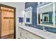 Double sinks and walk-in shower featured in this luxurious main bathroom at 6925 Emerald Springs Ln, Las Vegas, NV 89113