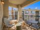 Comfortable balcony with seating offers views of surrounding desert community at 7111 S Durango Dr # 305, Las Vegas, NV 89113