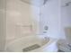 Clean and well-maintained bathroom showing the bathtub and tiled walls at 7111 S Durango Dr # 305, Las Vegas, NV 89113