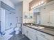 Bathroom featuring a bathtub, modern vanity, and a neutral color palette at 7111 S Durango Dr # 305, Las Vegas, NV 89113