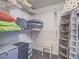 Walk-in closet featuring ample shelving, storage, and well-organized spaces at 7111 S Durango Dr # 305, Las Vegas, NV 89113