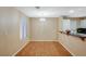 Dining area with decorative light fixture and breakfast bar at 8452 Boseck Dr # 110, Las Vegas, NV 89145