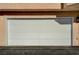 Spacious single-car garage door at 8452 Boseck Dr # 110, Las Vegas, NV 89145