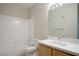 Modern bathroom featuring a shower over tub and updated vanity at 8501 W University Ave # 2020, Las Vegas, NV 89147