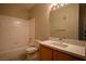 Bright bathroom with a tub and shower combination and a sleek vanity at 8501 W University Ave # 2020, Las Vegas, NV 89147