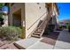 Exterior view of building with stairs and landscaping at 8501 W University Ave # 2020, Las Vegas, NV 89147