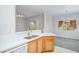 Open kitchen view showcasing countertops and seamless flow to the adjacent living space at 8501 W University Ave # 2020, Las Vegas, NV 89147