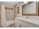 Updated bathroom featuring a vanity and updated bath and shower at 872 Linn Ln, Las Vegas, NV 89110