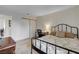 Comfortable bedroom featuring a closet, desk, and a cozy bed at 872 Linn Ln, Las Vegas, NV 89110