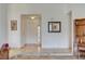 Welcoming entryway with neutral tile flooring and ample wall decor at 872 Linn Ln, Las Vegas, NV 89110