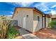 Exterior view features a private entrance, a door, and a well-maintained facade at 872 Linn Ln, Las Vegas, NV 89110
