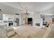 Open living space with bright kitchen, fireplace and comfortable seating at 872 Linn Ln, Las Vegas, NV 89110