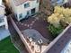 Well-maintained backyard showcasing a stone patio and landscaped surroundings for relaxation at 10556 Nantucket Ridge Ave, Las Vegas, NV 89166