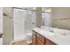Bathroom featuring a white vanity with storage and a glass-enclosed shower at 10556 Nantucket Ridge Ave, Las Vegas, NV 89166