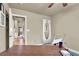 Neutral bedroom with a ceiling fan, natural light, and door to an adjacent room at 10556 Nantucket Ridge Ave, Las Vegas, NV 89166