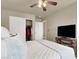 Relaxing bedroom with a ceiling fan, large closet, and a TV for your entertainment at 10556 Nantucket Ridge Ave, Las Vegas, NV 89166