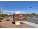 Huckleberry Park sign near sidewalk and desert landscaping in the Providence community at 10556 Nantucket Ridge Ave, Las Vegas, NV 89166