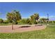 Picturesque park view featuring walking paths and trees, creating a peaceful and scenic community space at 10556 Nantucket Ridge Ave, Las Vegas, NV 89166