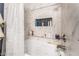 Bathroom featuring a large tub and shelving with toiletries at 1071 Nordyke Ave, Henderson, NV 89015