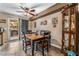 Cozy dining area with a ceiling fan and backyard access at 1071 Nordyke Ave, Henderson, NV 89015