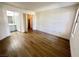 A bedroom features wood floors and neutral walls with access to closet and bath at 1150 N Buffalo Dr # 1005, Las Vegas, NV 89128